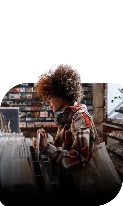 A fan browsing vinyl in a record shop
